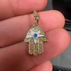 Gold and Blue Hamsa Necklace with Intricate Design